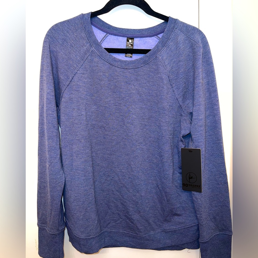 Long sleeve shirt. Very soft material inside and out. Breathable, not thick.